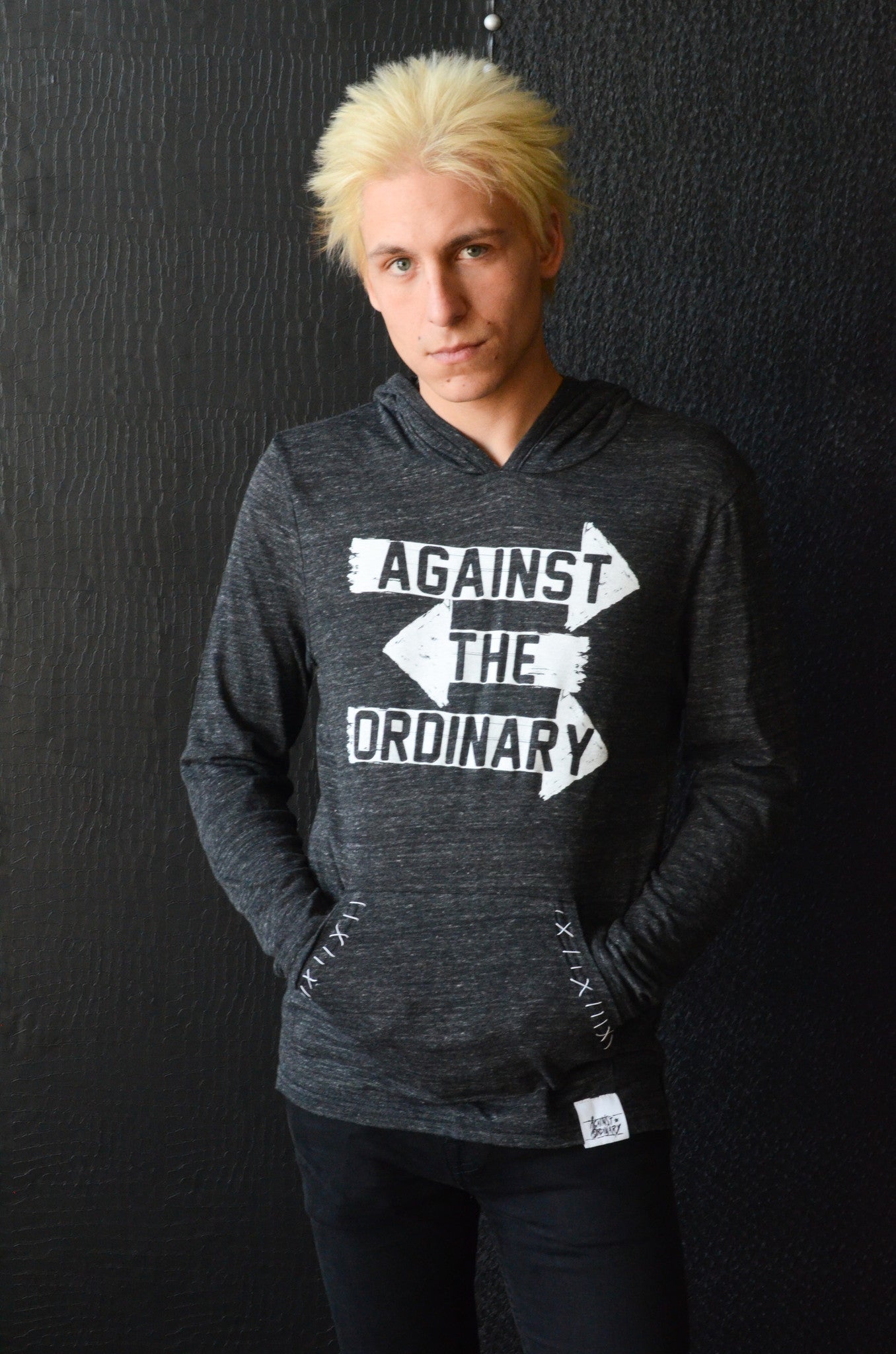 Unisex AGAINST THE ORDINARY Long Sleeved Hooded Tee with ARROW Design