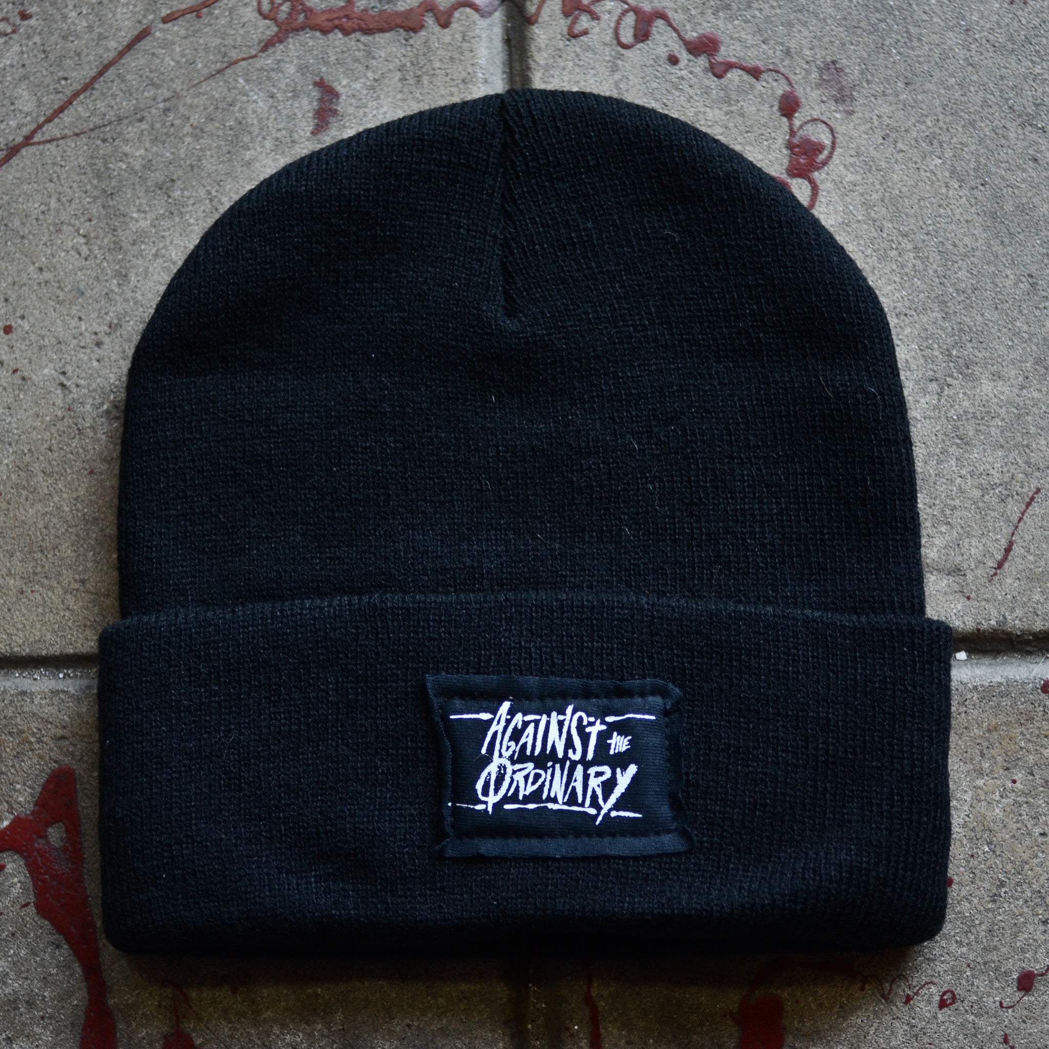 Against the Ordinary Black Beanie with Black Stitched Label
